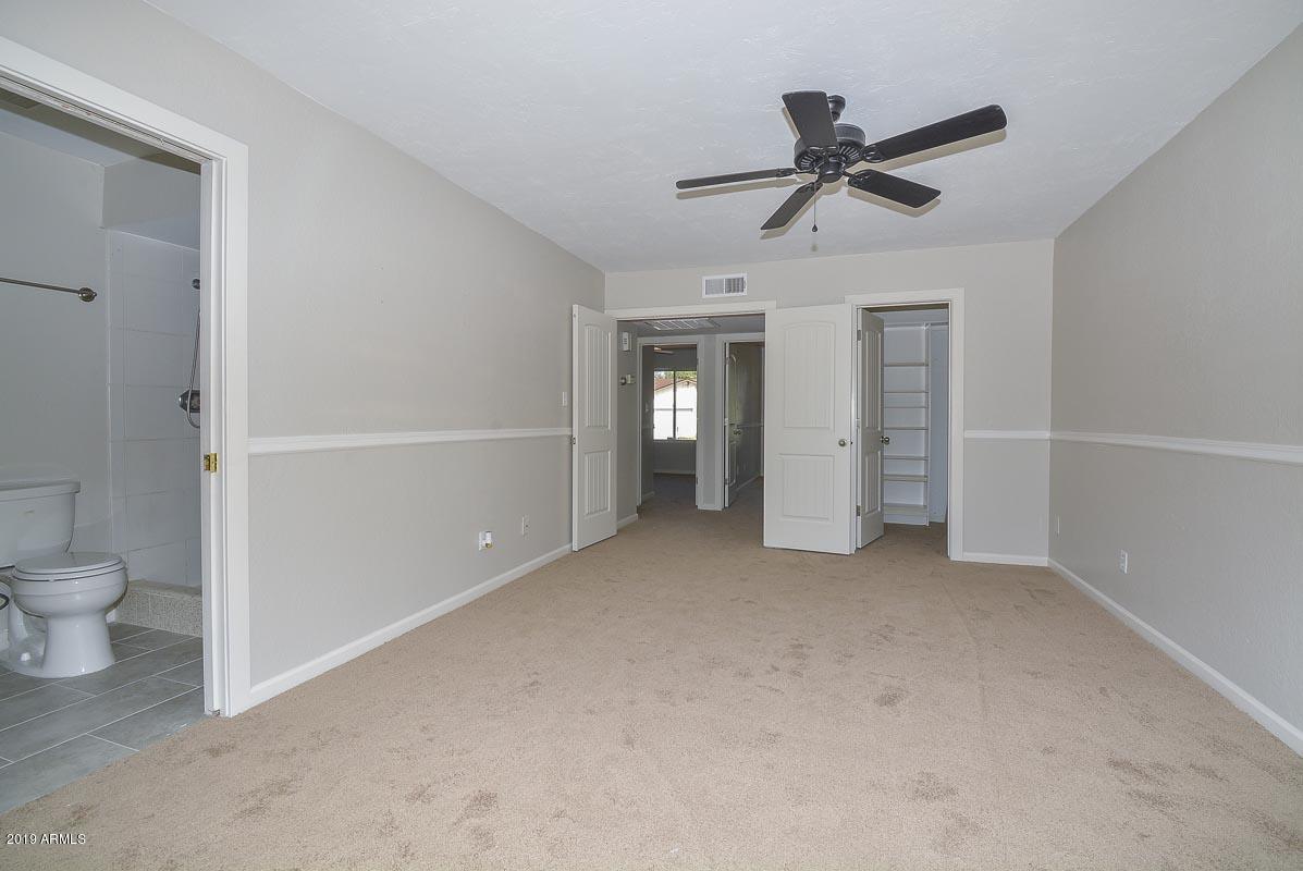 3935 West Calavar Road Phoenix, AZ 85053 - Photo 19 of 27 Master Bedroom-Bath