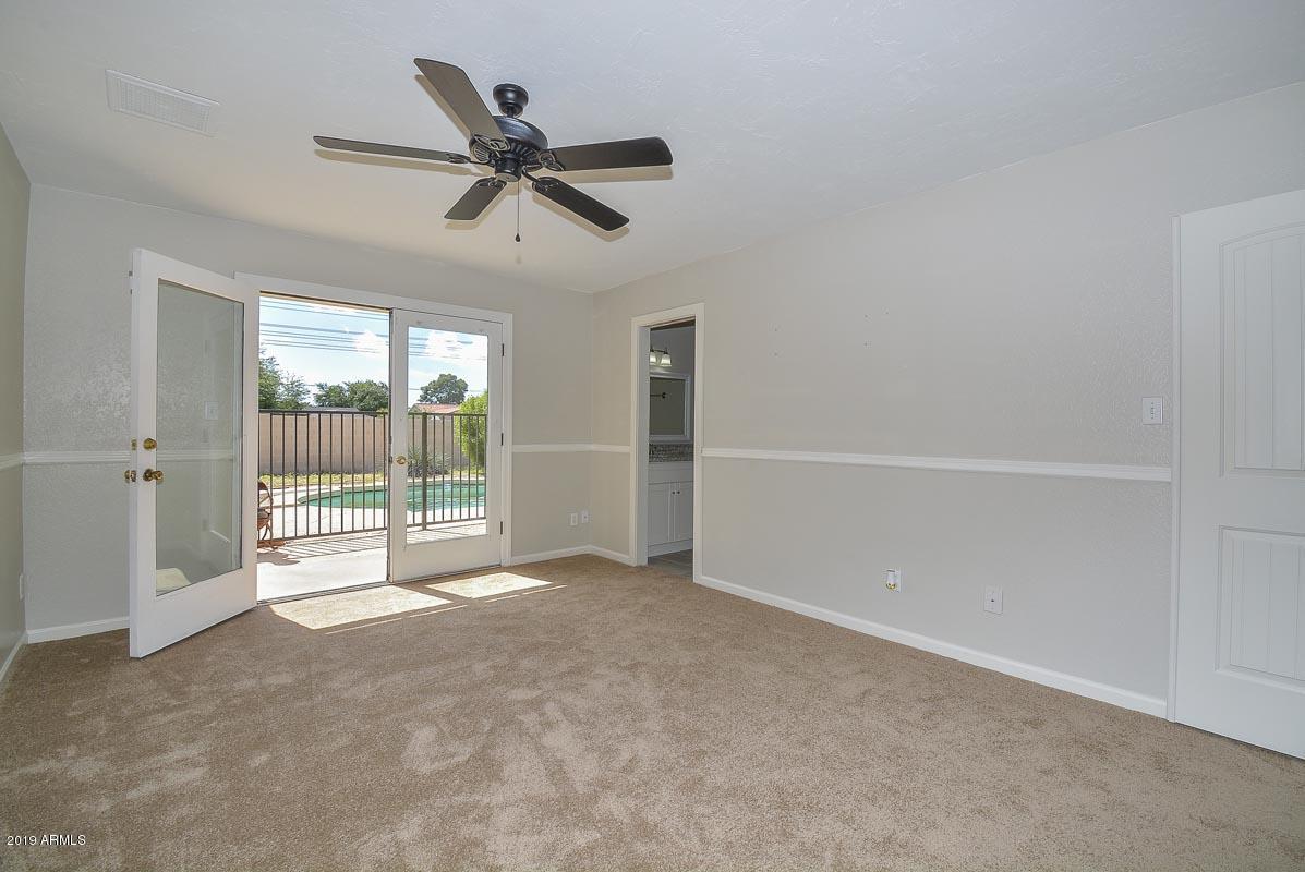 3935 West Calavar Road Phoenix, AZ 85053 - Photo 20 of 27 Master Bedroom