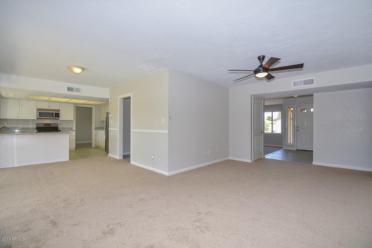 3935 West Calavar Road Phoenix, AZ 85053 - Photo 5 of 27 Family Room-Kitchen