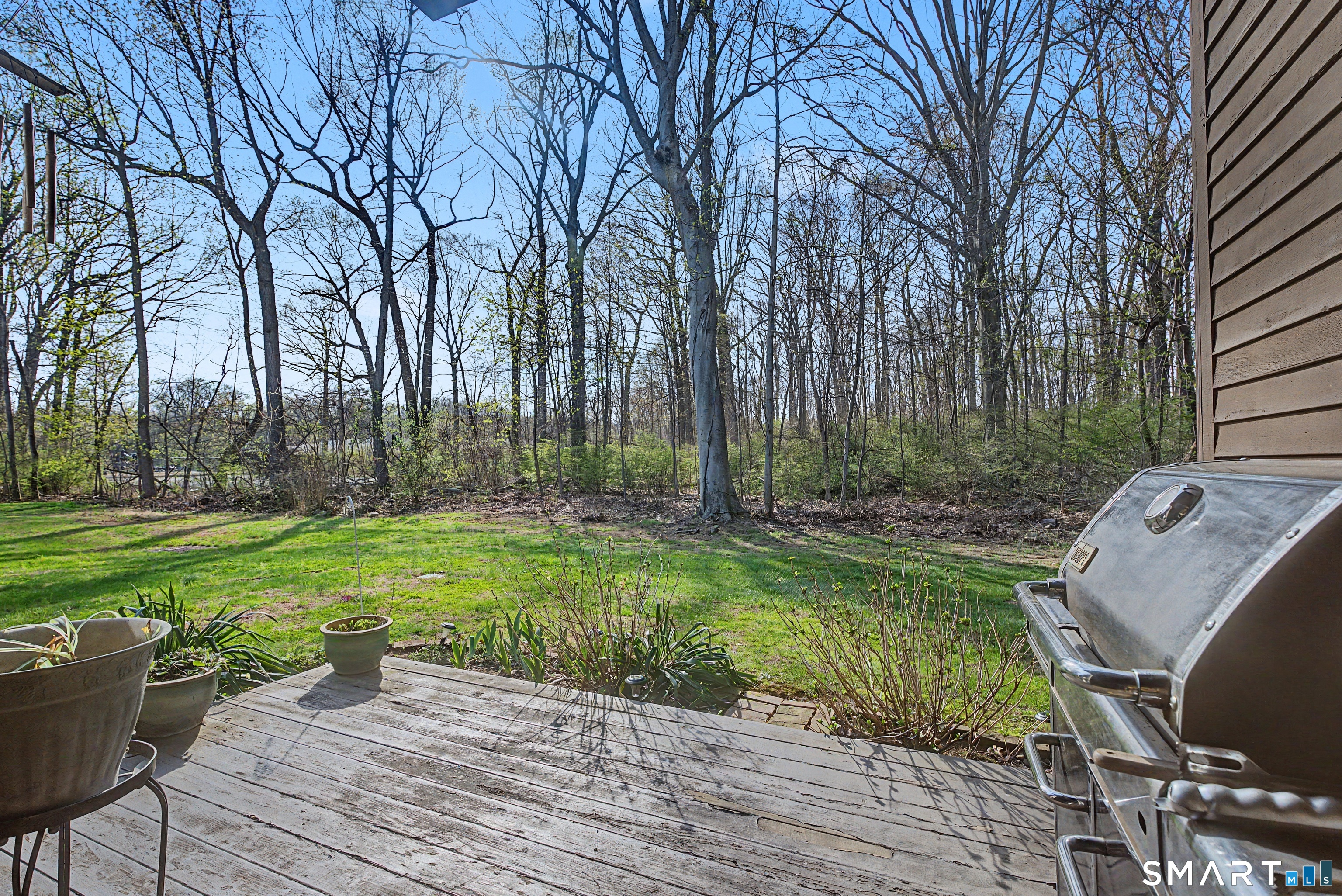 900 Mix Avenue, Unit 60 Hamden, CT 06514 - Photo 16 of 21 a view of backyard with outdoor seating and green space