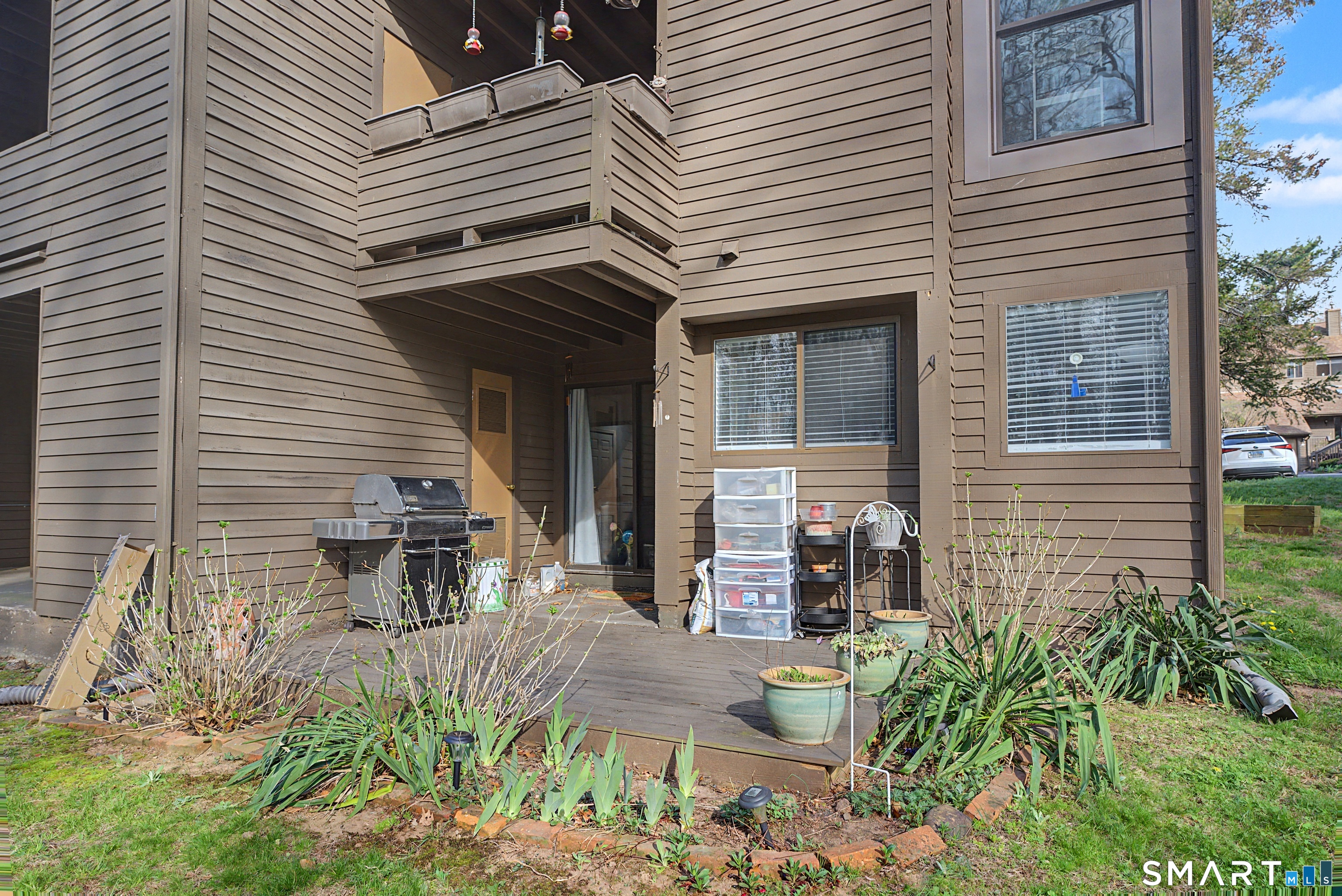 900 Mix Avenue, Unit 60 Hamden, CT 06514 - Photo 17 of 21 front view of a house with a patio