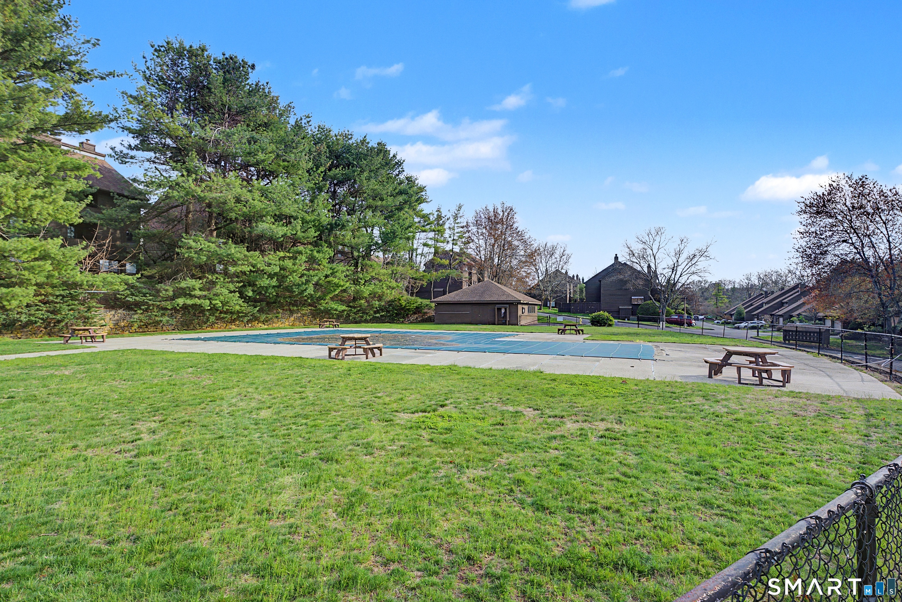 900 Mix Avenue, Unit 60 Hamden, CT 06514 - Photo 19 of 21 a view of a golf course with a swimming pool