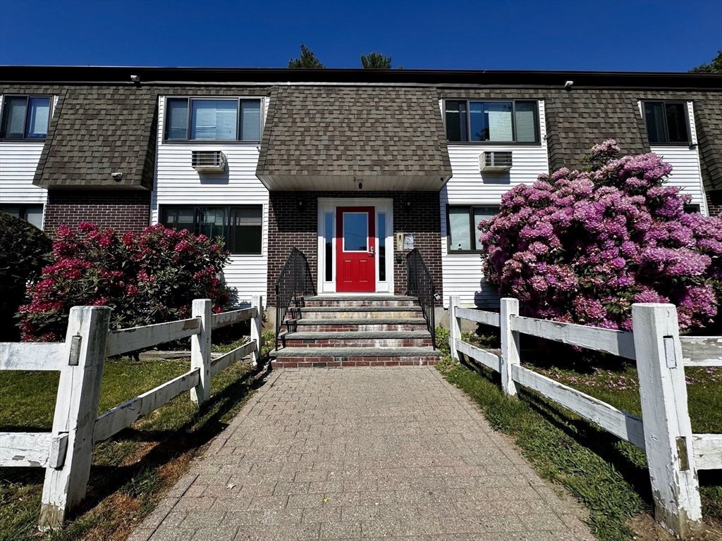 18 Pierce Street, Unit 3B Foxboro, MA 02035 - Photo 16 of 21 a front view of a house