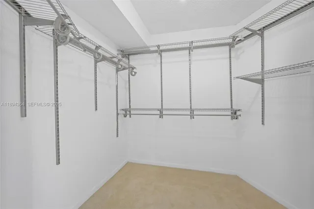 a view of a room with rack on the wall
