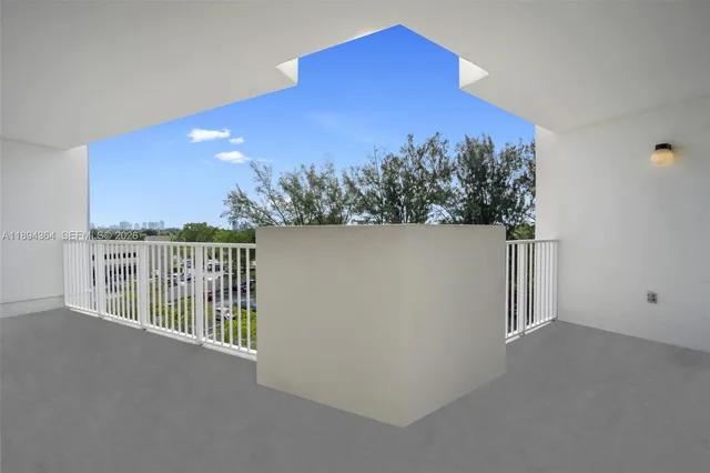 a view of a balcony with an outdoor space