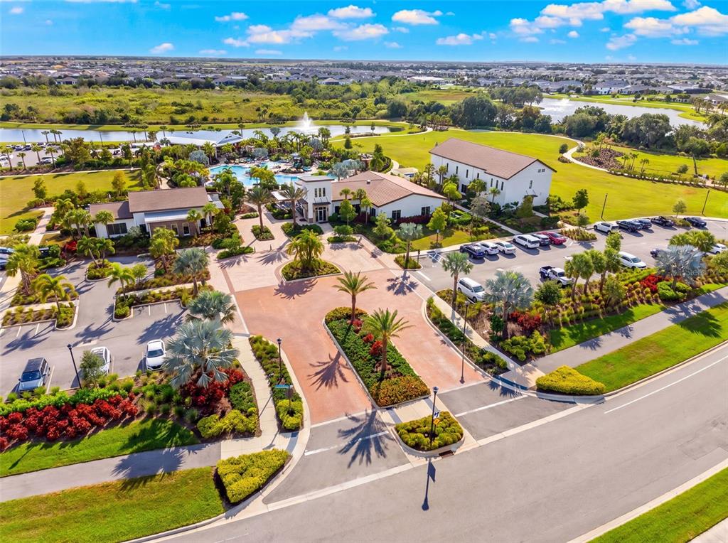18237 Beach Ranch Terrace Bradenton, FL 34211 - Photo 61 of 72 an aerial view of residential houses with outdoor space