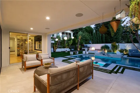 a outdoor living space with furniture and garden view