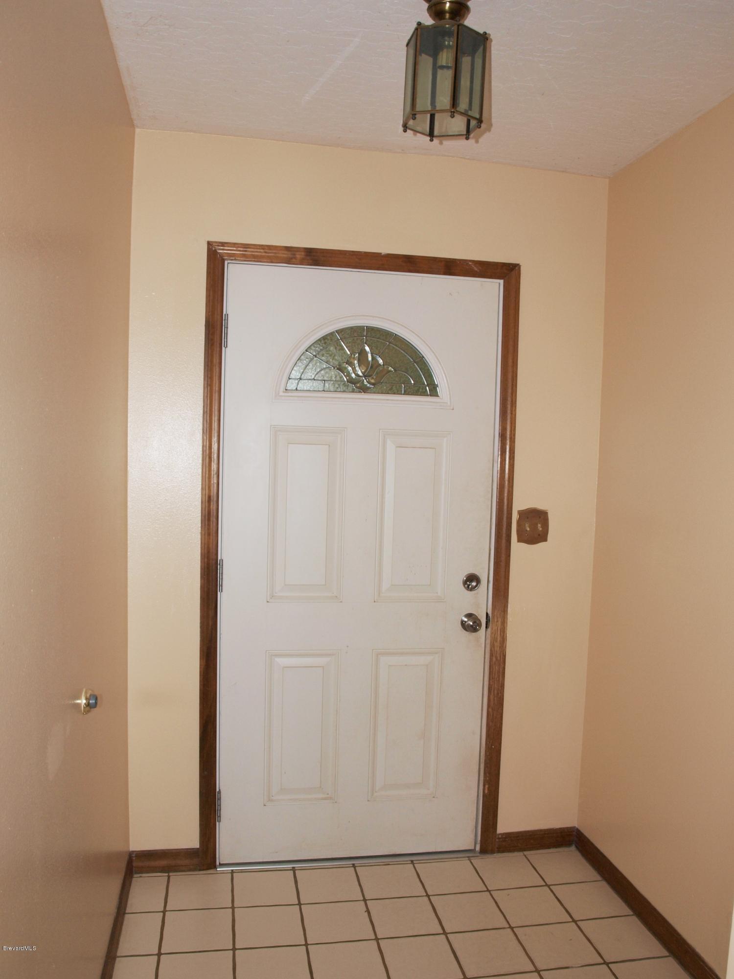 225 East Crisafulli Road Merritt Island, FL 32953 - Photo 3 of 32 Foyer