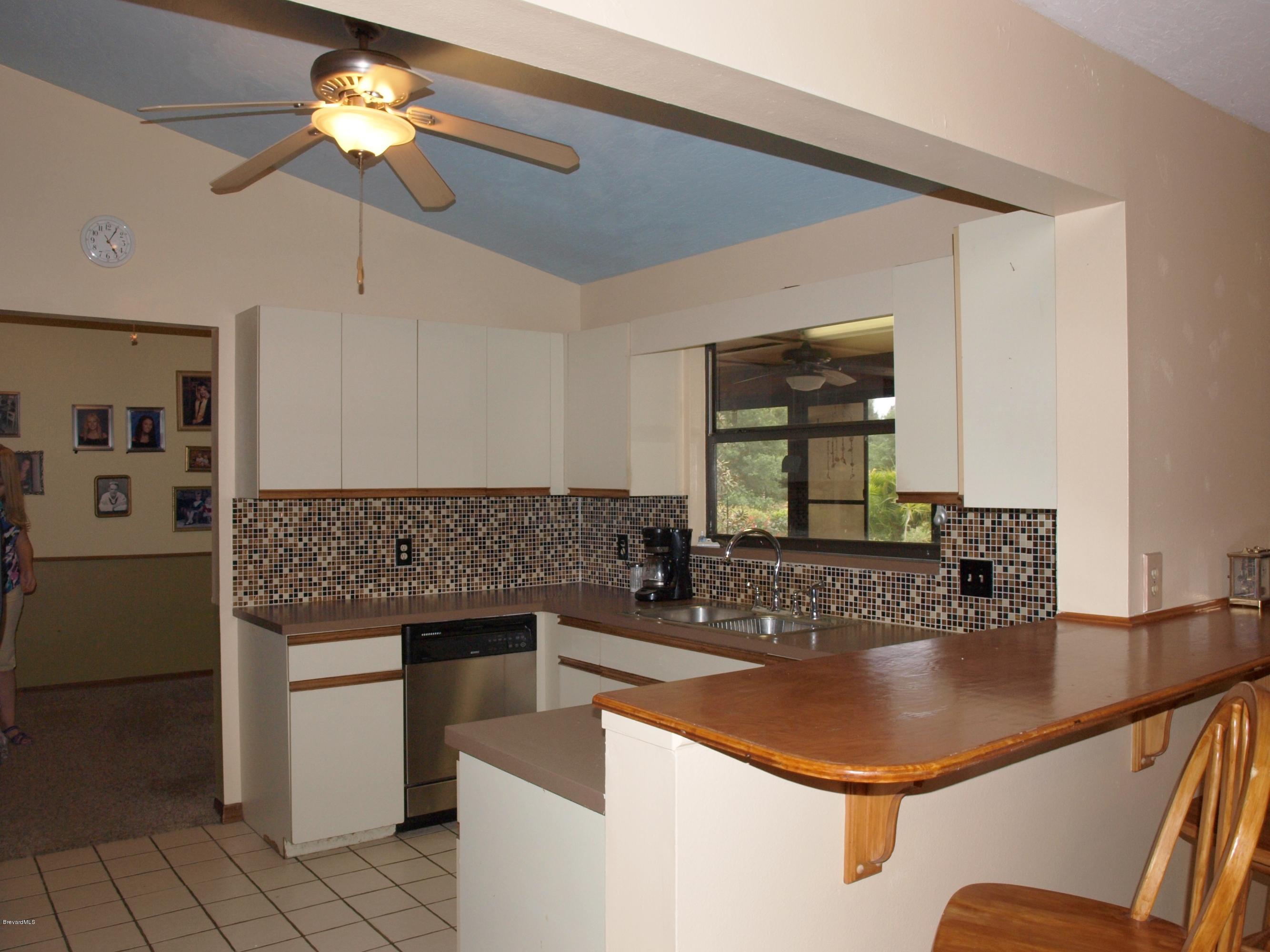 225 East Crisafulli Road Merritt Island, FL 32953 - Photo 8 of 32 Kitchen1