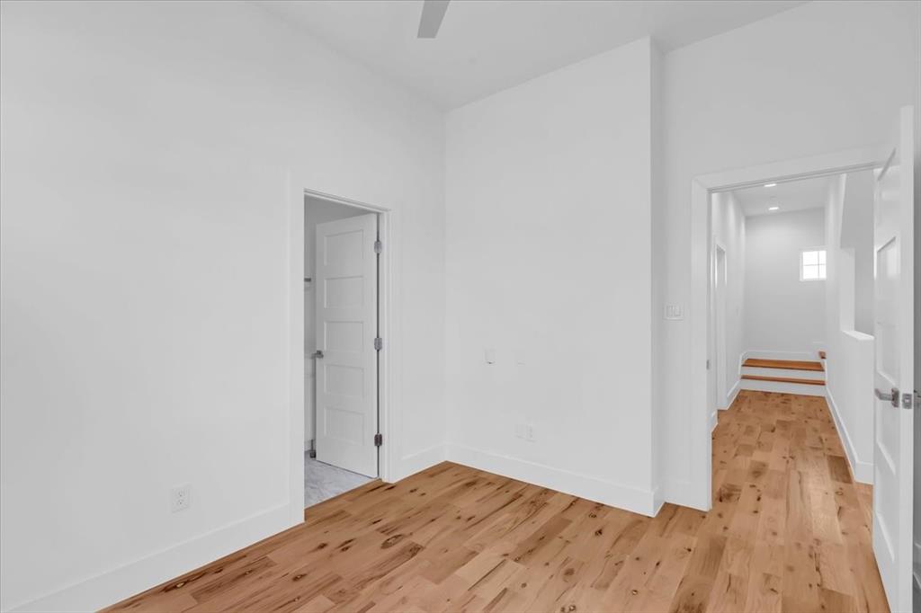 1910 Caddo Street, Unit A205 Dallas, TX 75204 - Photo 20 of 36 a view of hallway with wooden floor