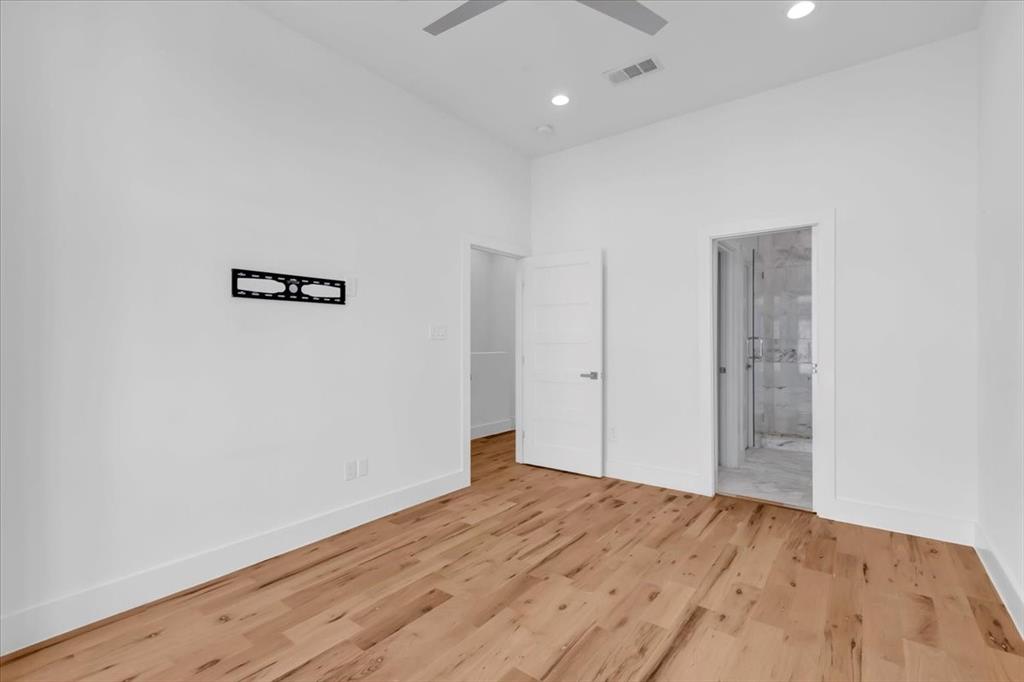 1910 Caddo Street, Unit A205 Dallas, TX 75204 - Photo 25 of 36 a view of a livingroom with wooden floor