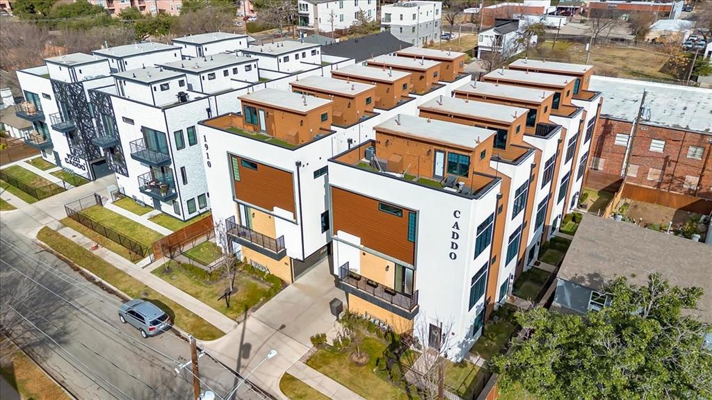 1910 Caddo Street, Unit A205 Dallas, TX 75204 - Photo 32 of 36 an aerial view of a multi story residential apartment building