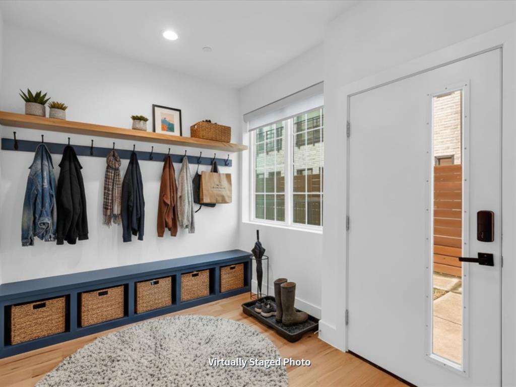 1910 Caddo Street, Unit A205 Dallas, TX 75204 - Photo 5 of 36 a view of a living room and a window