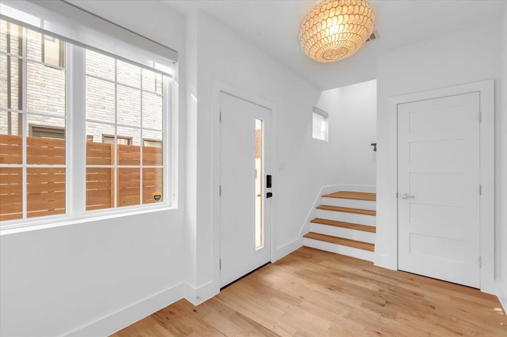 1910 Caddo Street, Unit A205 Dallas, TX 75204 - Photo 7 of 36 a view of an entryway with wooden floor
