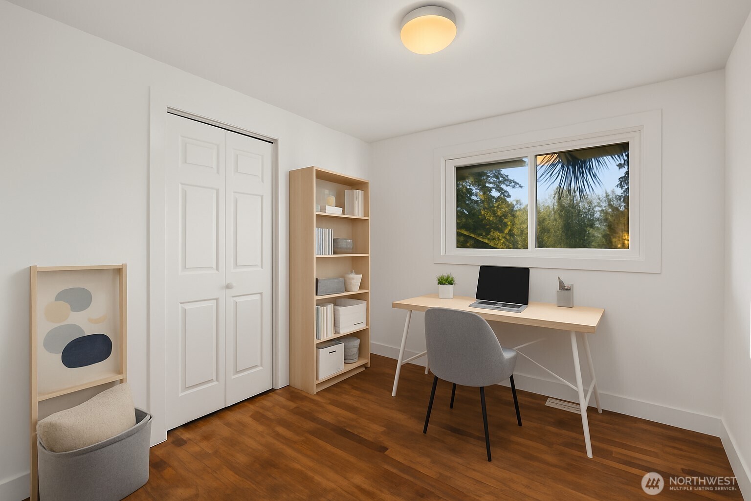 1212 South 230th Street Des Moines, WA 98198 - Photo 11 of 32 a workspace with furniture and wooden floor