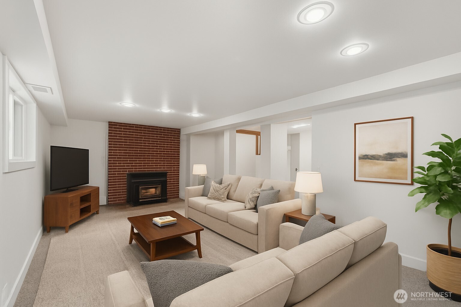 1212 South 230th Street Des Moines, WA 98198 - Photo 16 of 32 a living room with furniture a fireplace and a potted plant