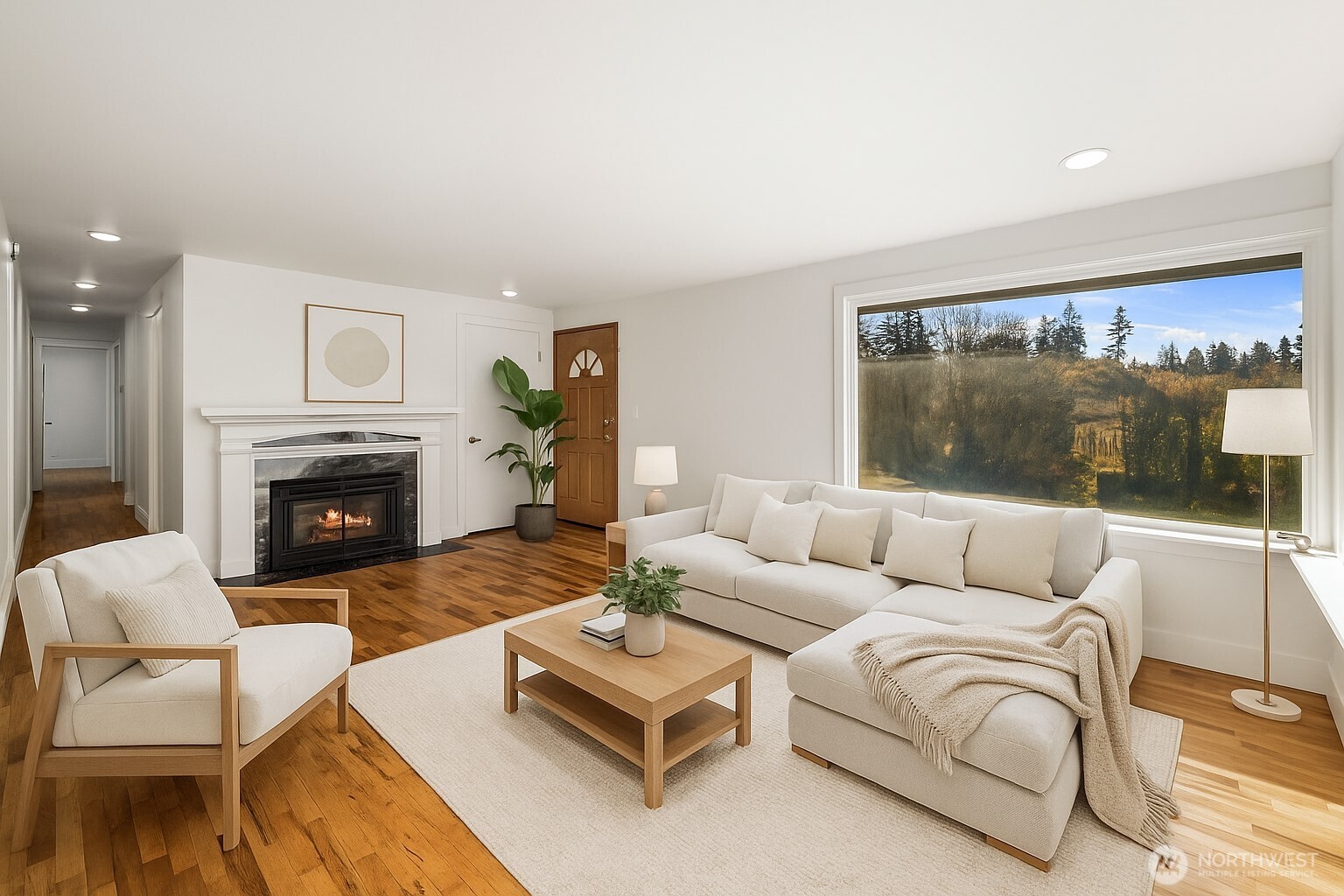 1212 South 230th Street Des Moines, WA 98198 - Photo 4 of 32 a living room with furniture and a fireplace