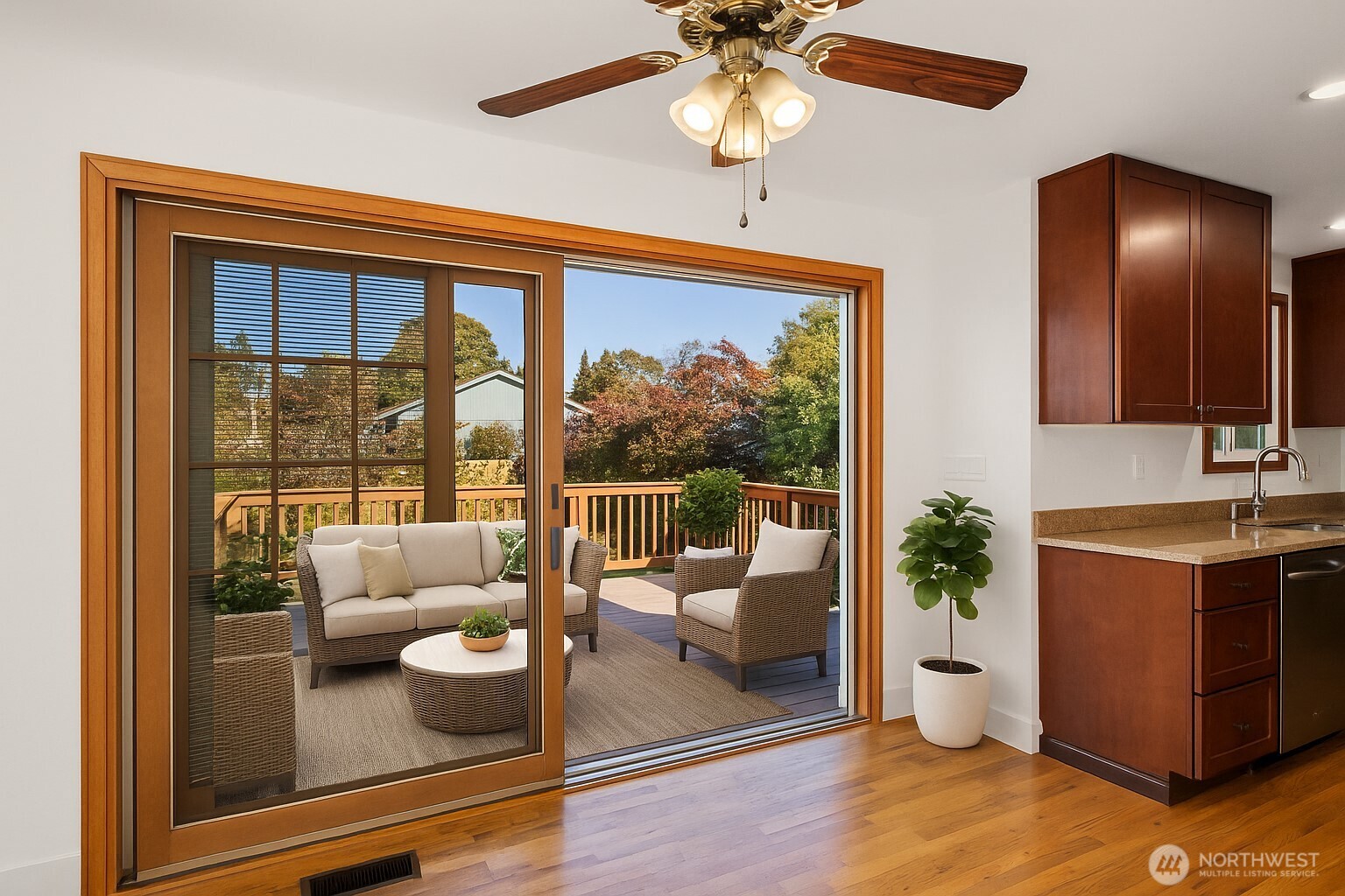 1212 South 230th Street Des Moines, WA 98198 - Photo 8 of 32 a view of a dining room with furniture a chandelier and wooden floor