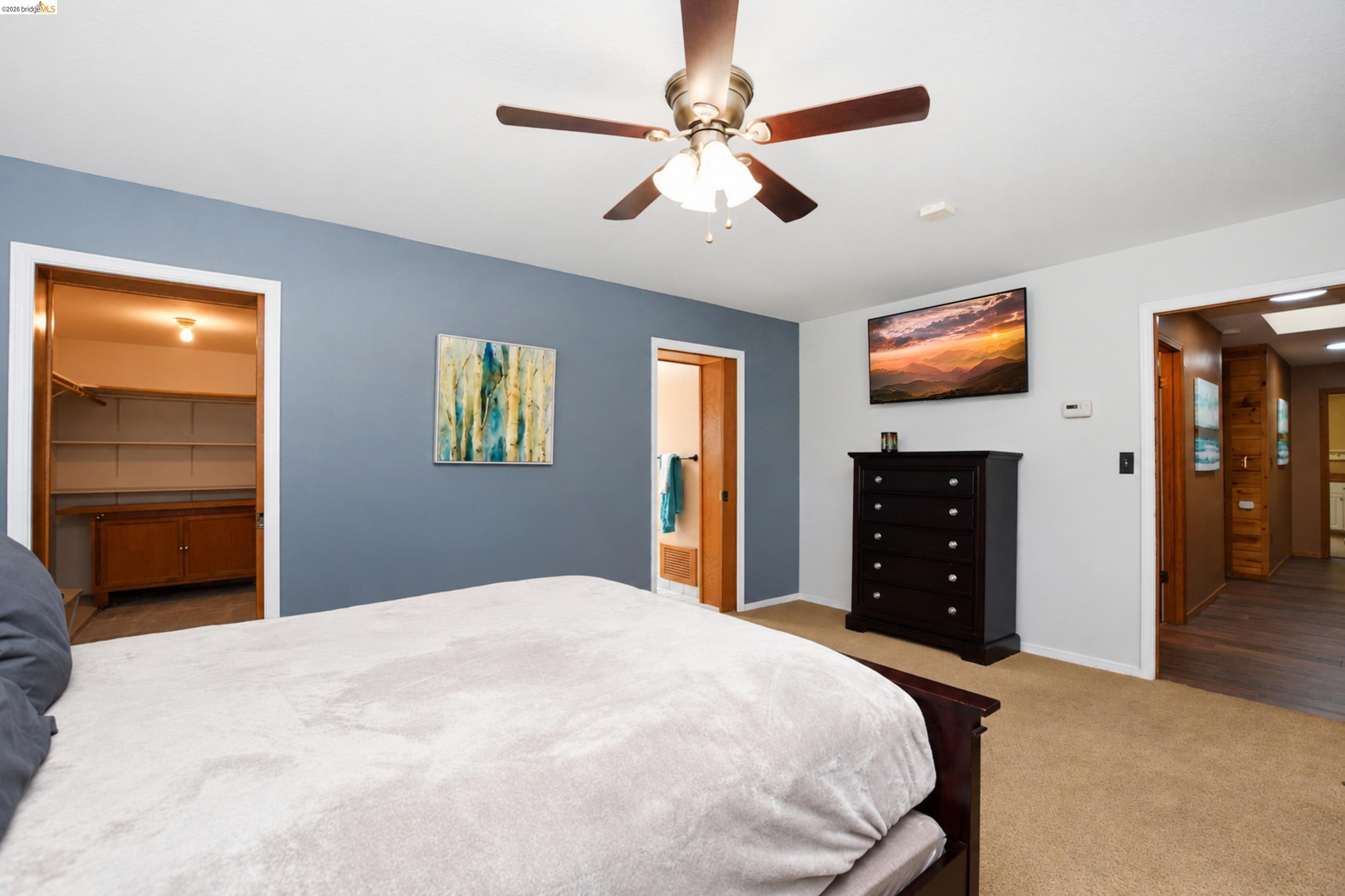 340 West Bolton Road Oakley, CA 94561 - Photo 32 of 87 Ceiling fan with integrated lighting, carpeted flooring, and a wall-mounted television