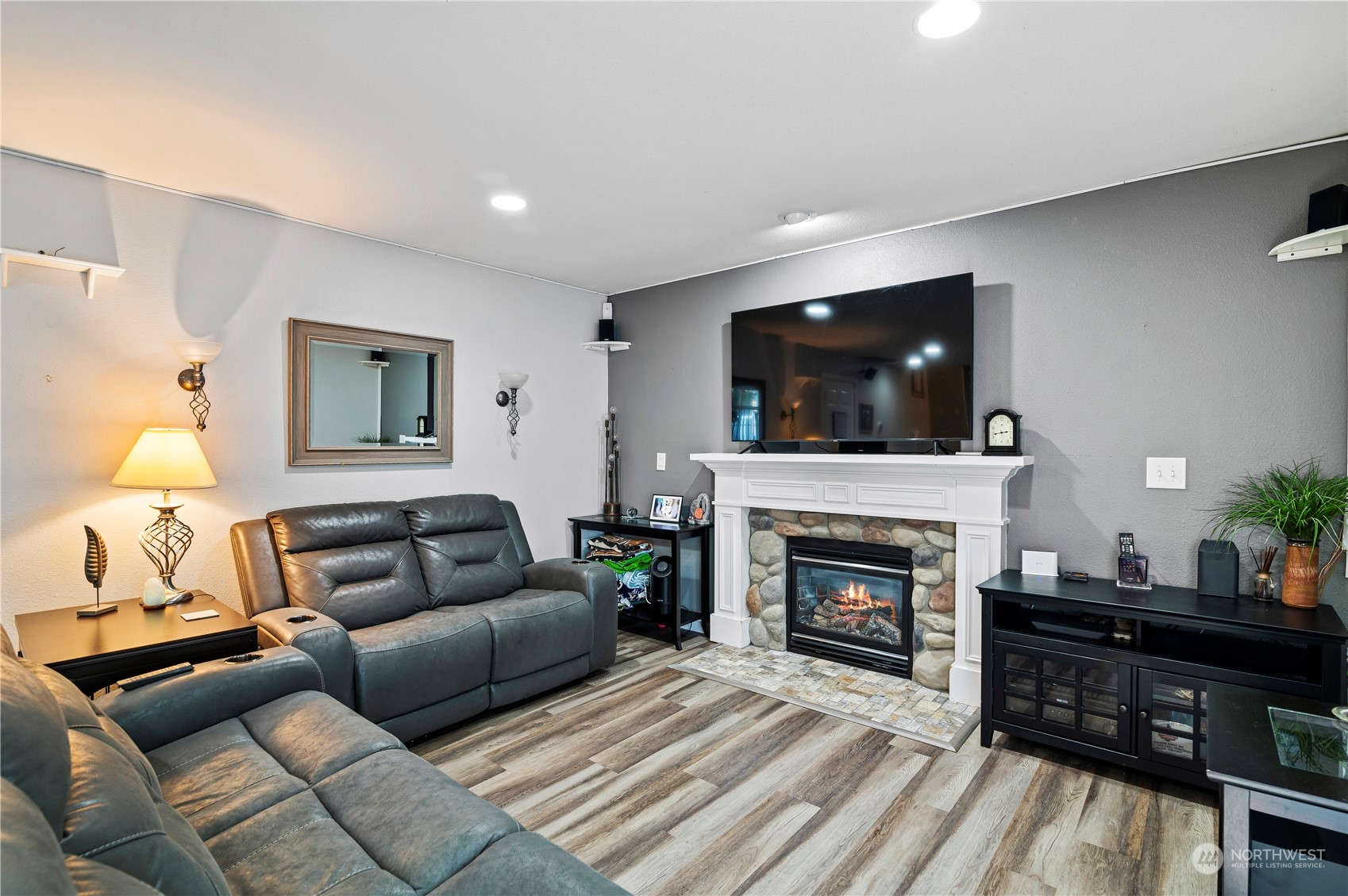 2502 97th Place Southeast Everett, WA 98208 - Photo 15 of 29 a living room with furniture and a fireplace