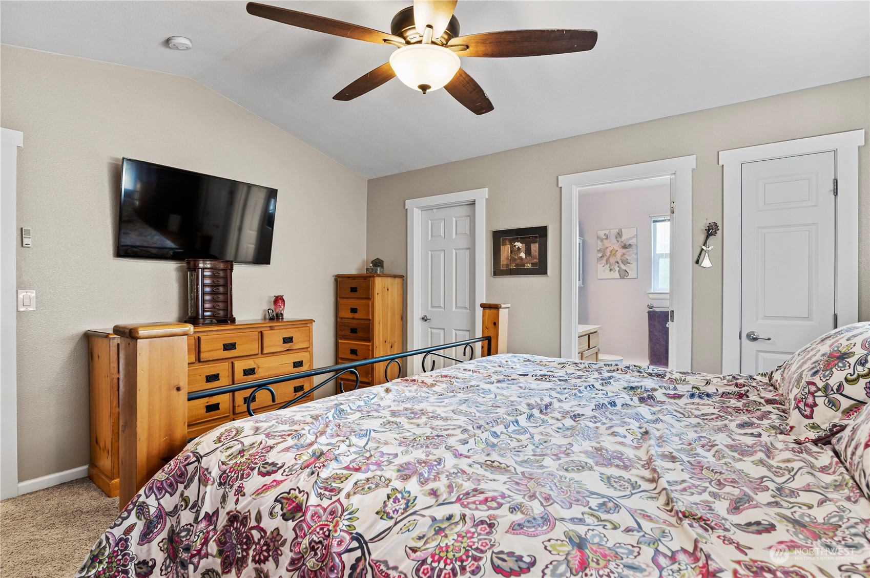 2502 97th Place Southeast Everett, WA 98208 - Photo 18 of 29 a bedroom with a bed and a flat screen tv