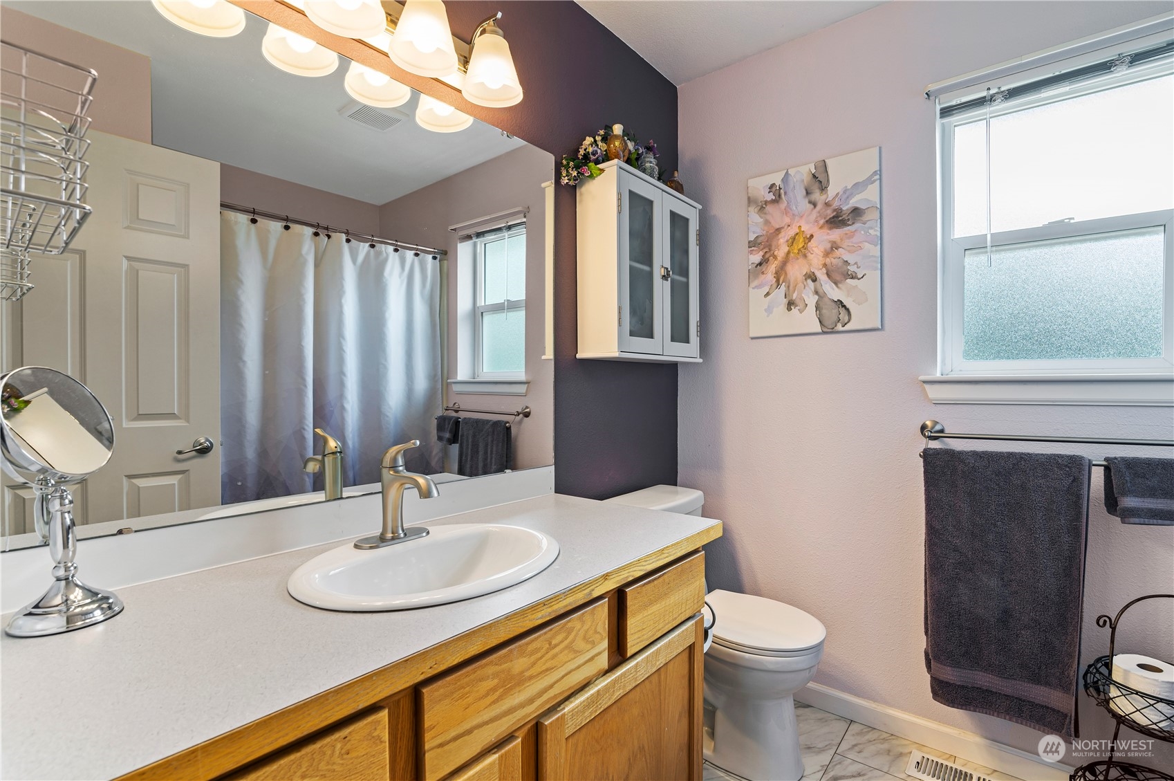 2502 97th Place Southeast Everett, WA 98208 - Photo 19 of 29 a bathroom with double sink and a toilet