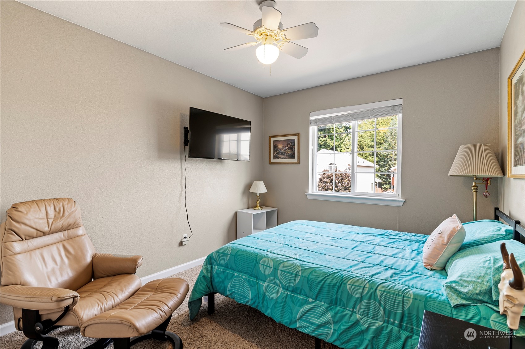2502 97th Place Southeast Everett, WA 98208 - Photo 21 of 29 a bedroom with a bed and a window