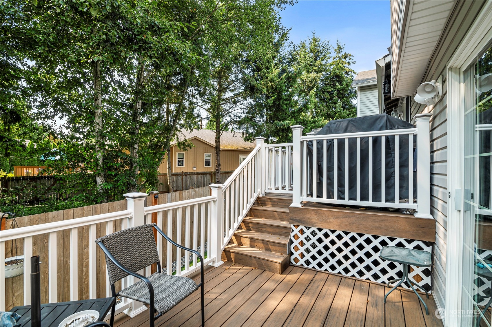 2502 97th Place Southeast Everett, WA 98208 - Photo 26 of 29 a view of a wooden bench with large trees