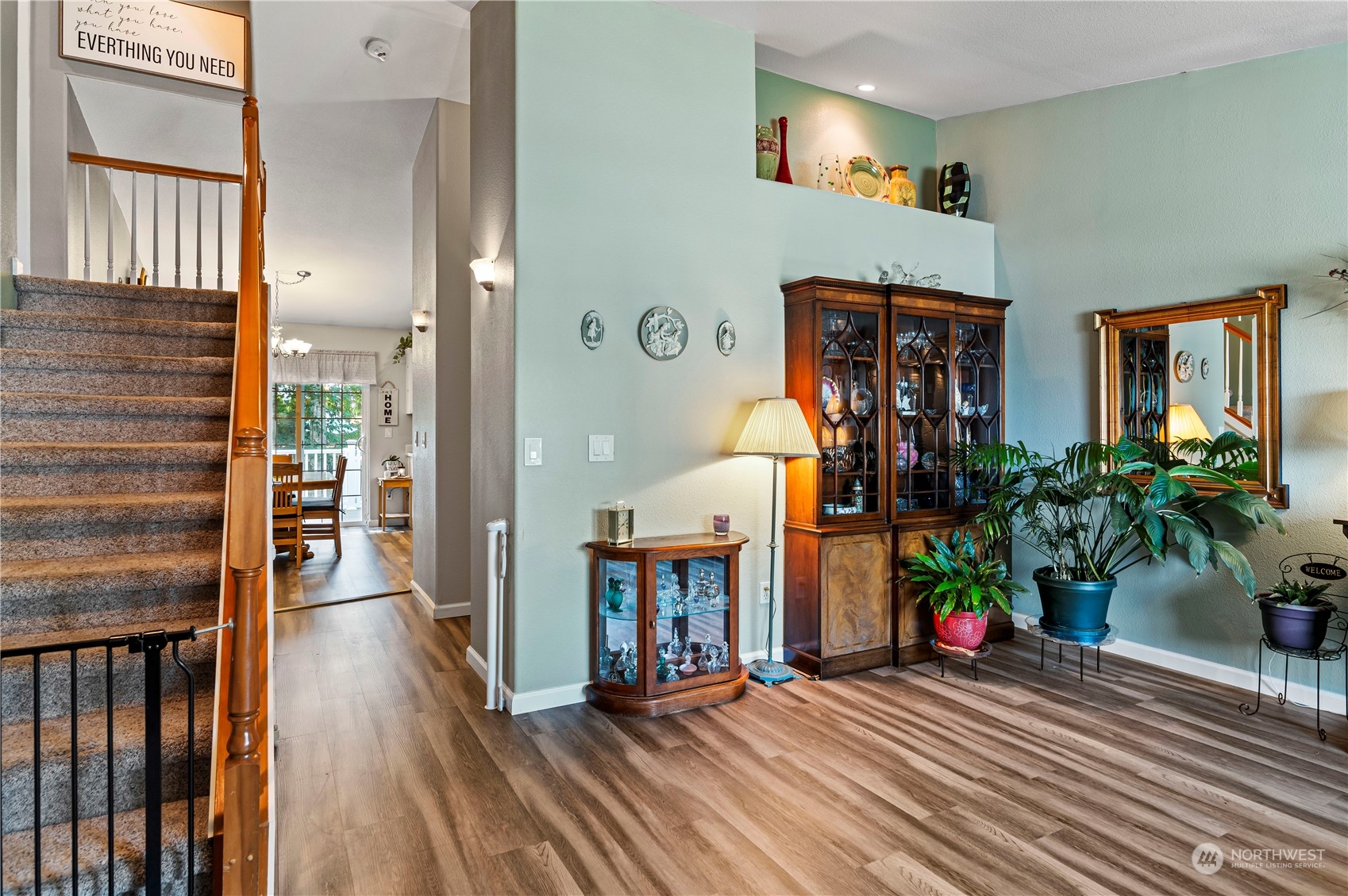 2502 97th Place Southeast Everett, WA 98208 - Photo 5 of 29 a view of a hallway with wooden floor and a potted plant