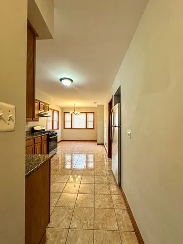 a view of a kitchen with a sink