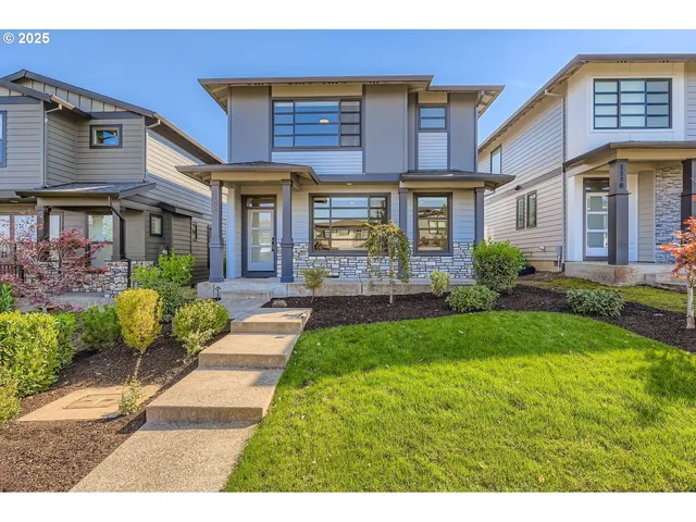 a view of a brick building with a yard