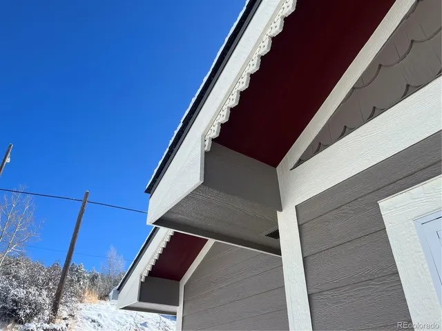 a view of a street with benches