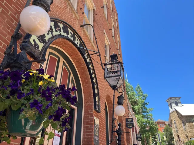 a view of a car park in front of a building