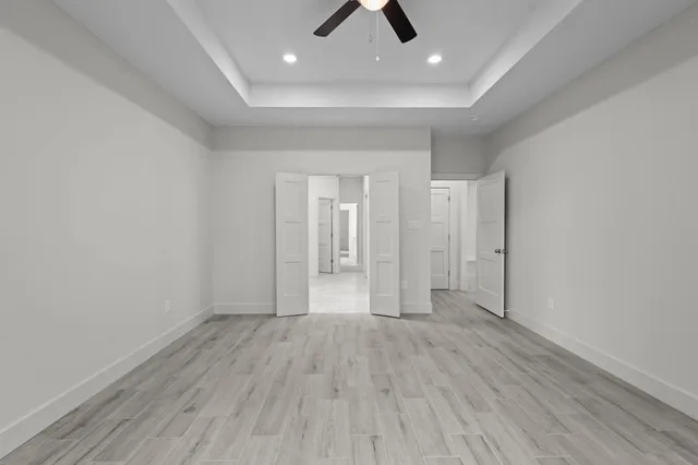 a bathroom with a bathtub and shower