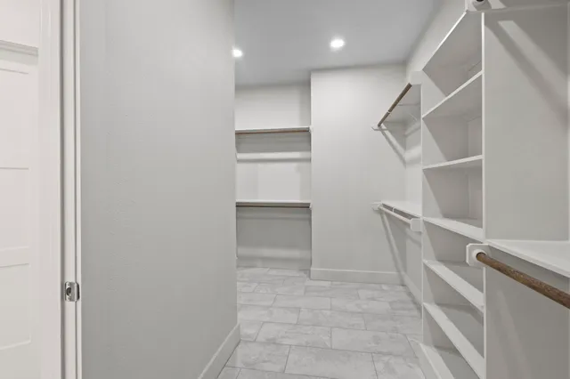 a view of a room with racks on the wall