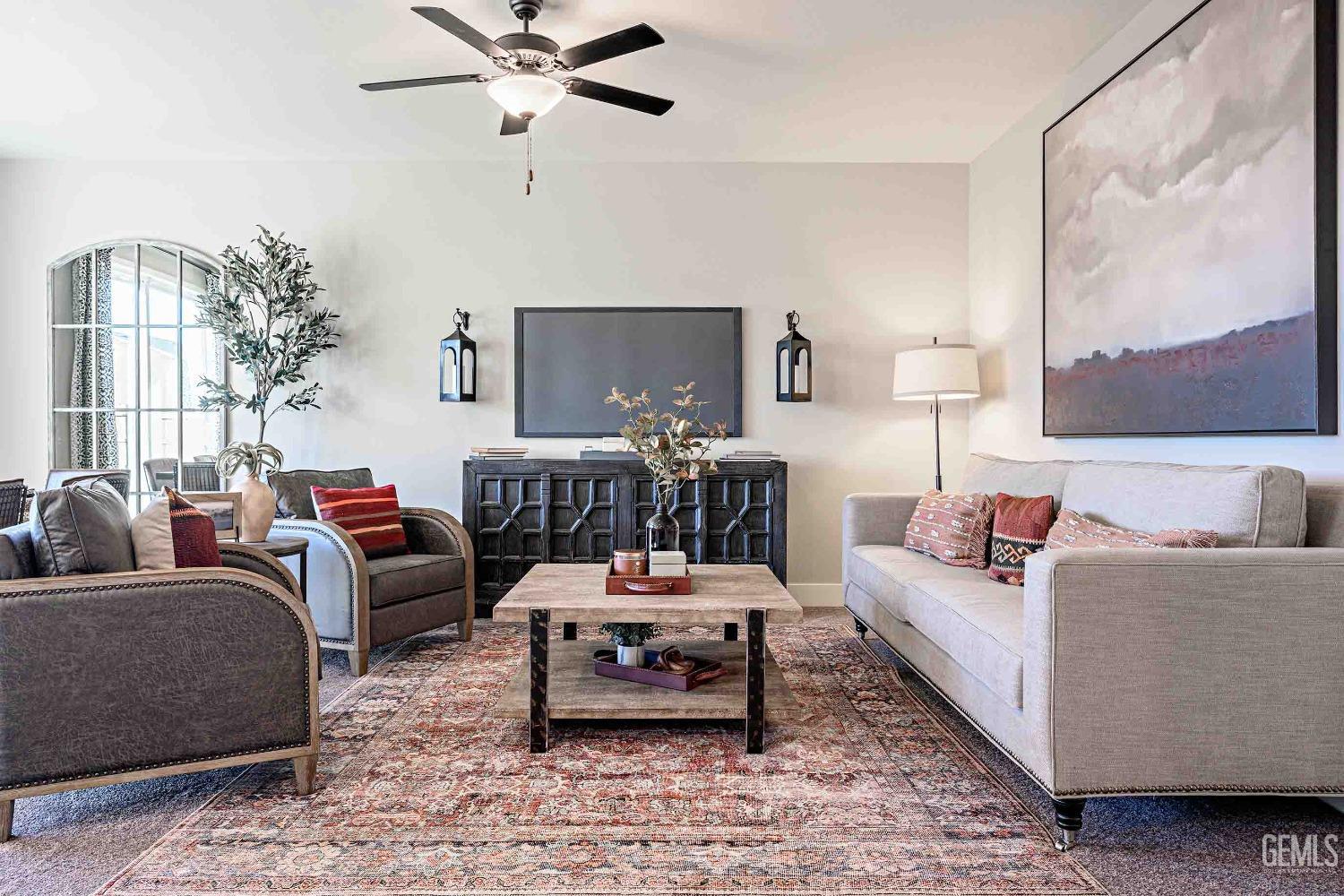 Undisclosed Address Bakersfield, CA 93313 - Photo 8 of 27 a living room with furniture and a large window