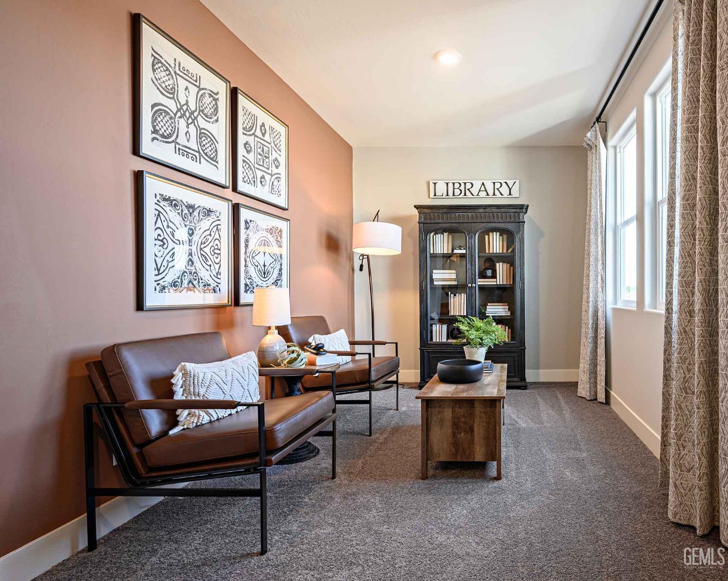 Undisclosed Address Bakersfield, CA 93313 - Photo 10 of 27 a living room with furniture and large windows