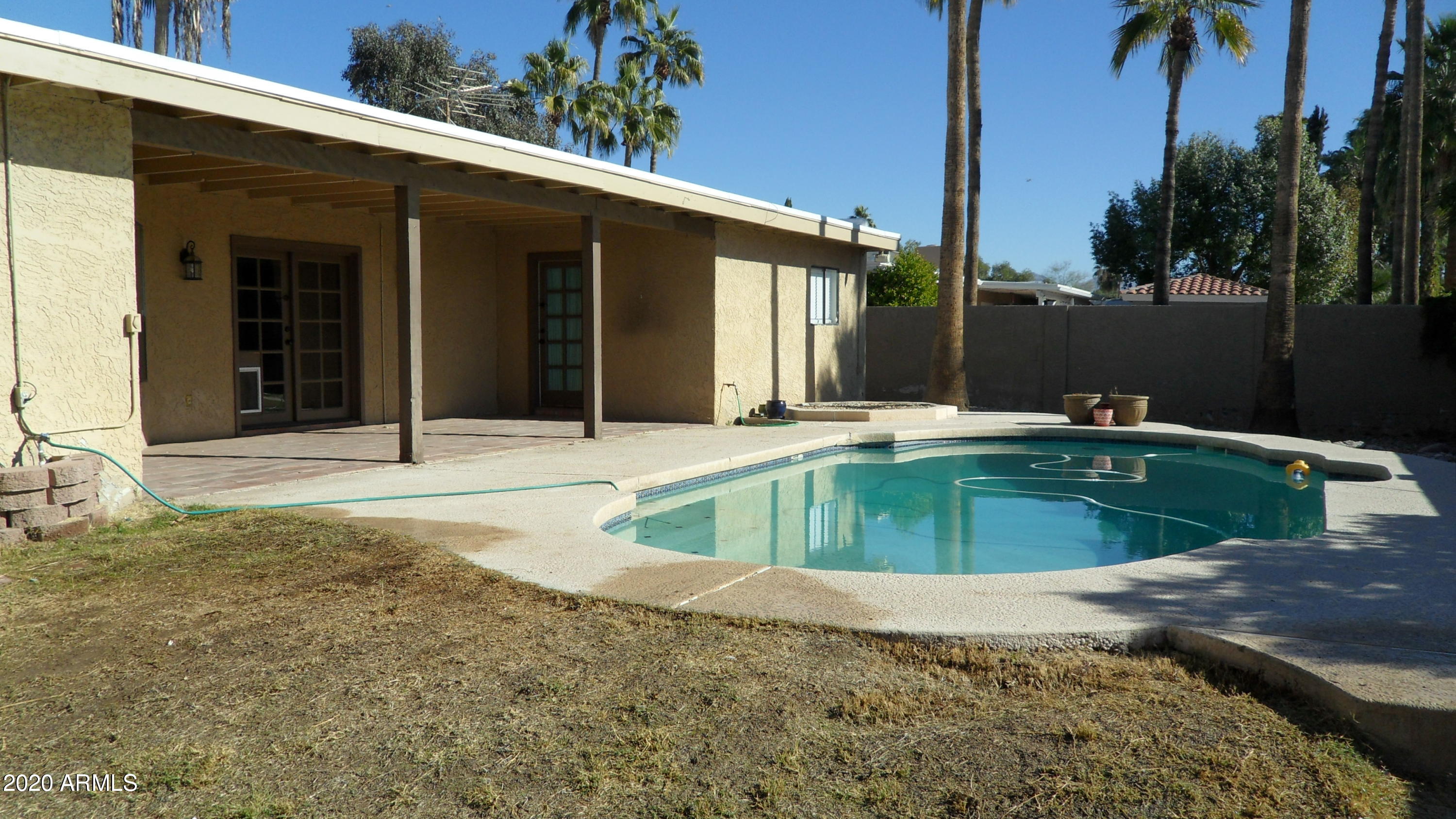 6935 East Hearn Road Scottsdale, AZ 85254 - Photo 18 of 19 COVERED PATIO W/ POOL