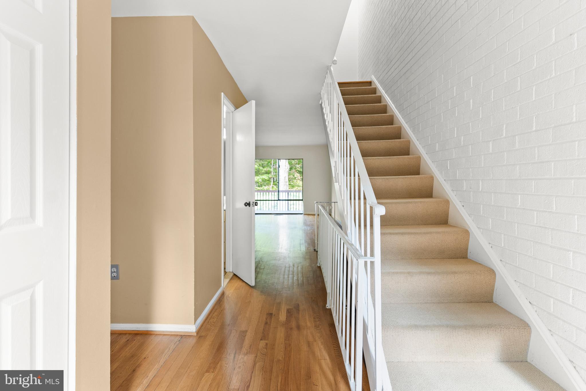 7911 Inverness Ridge Road Potomac, MD 20854 - Photo 18 of 45 a view of entryway and hall with wooden floor