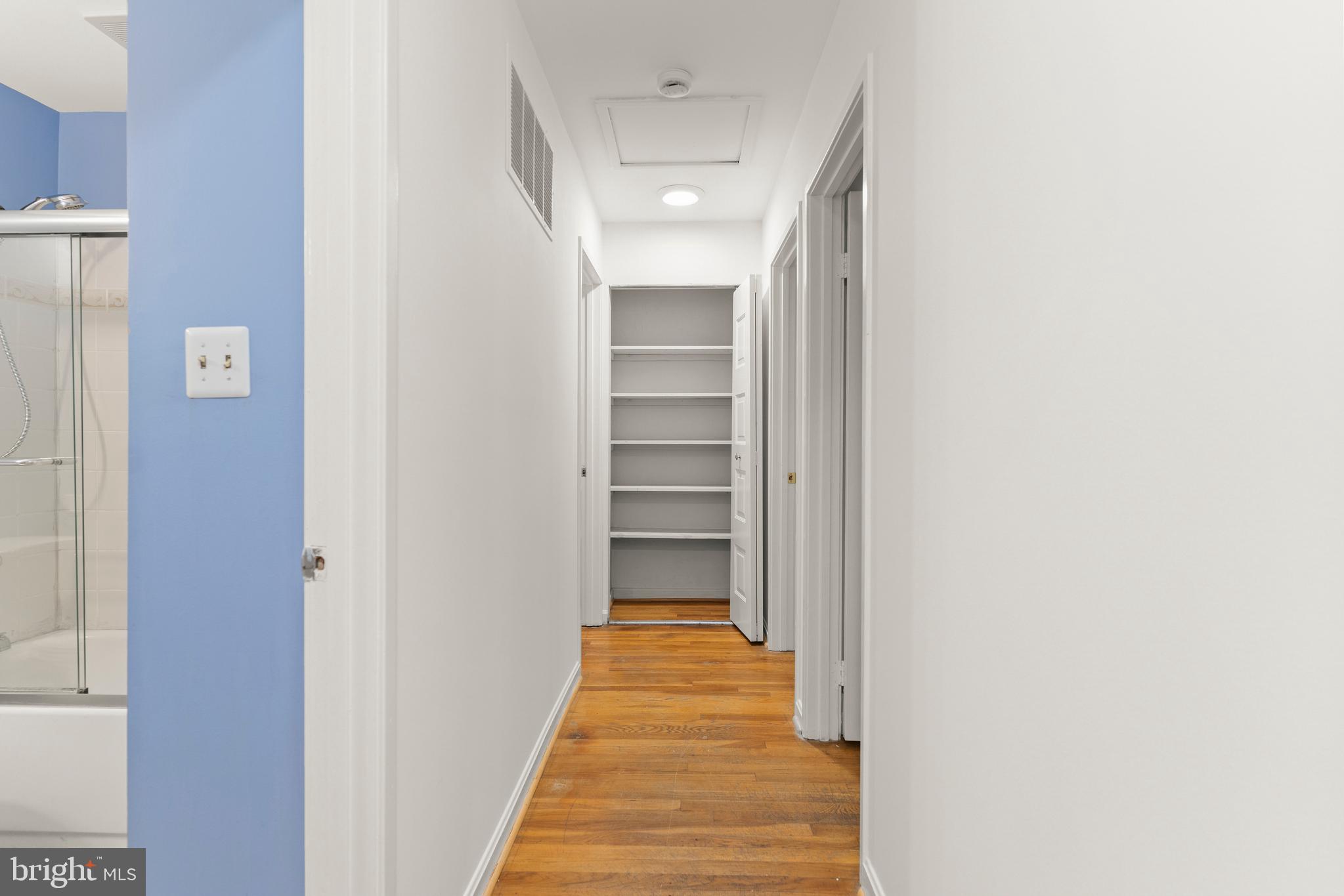 7911 Inverness Ridge Road Potomac, MD 20854 - Photo 21 of 45 a view of a hallway with wooden floor and entryway