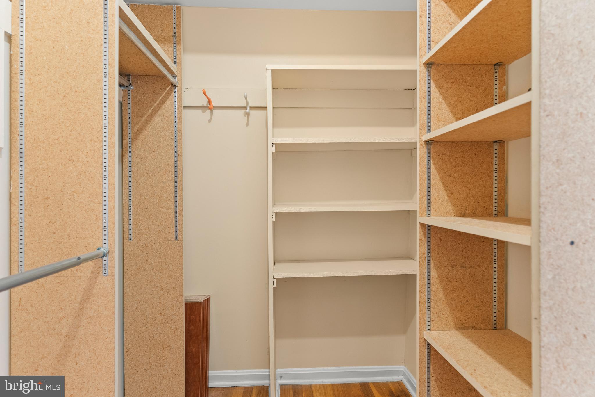 7911 Inverness Ridge Road Potomac, MD 20854 - Photo 31 of 45 a view of walk in closet with empty racks