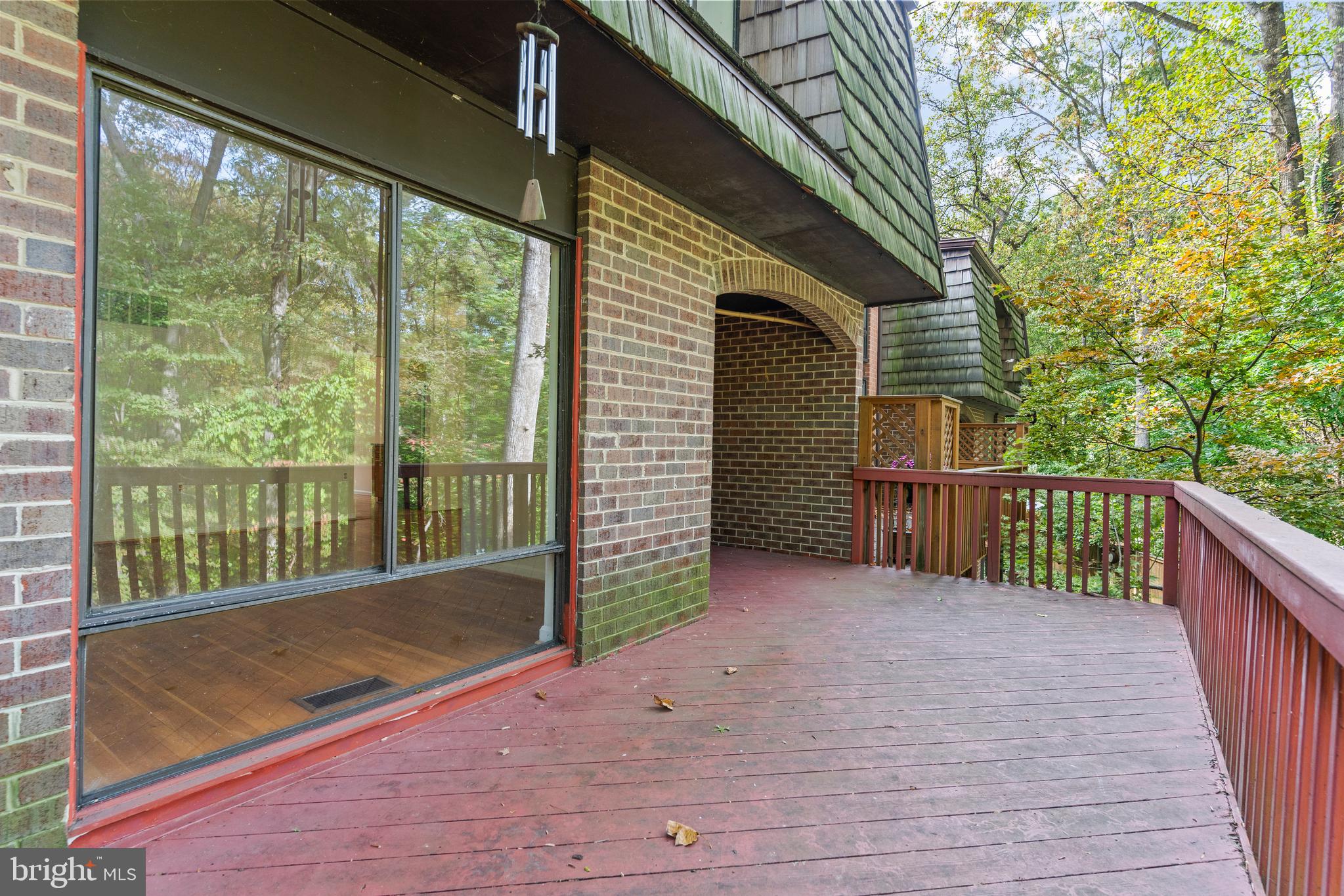 7911 Inverness Ridge Road Potomac, MD 20854 - Photo 38 of 45 a view of a balcony with wooden floor