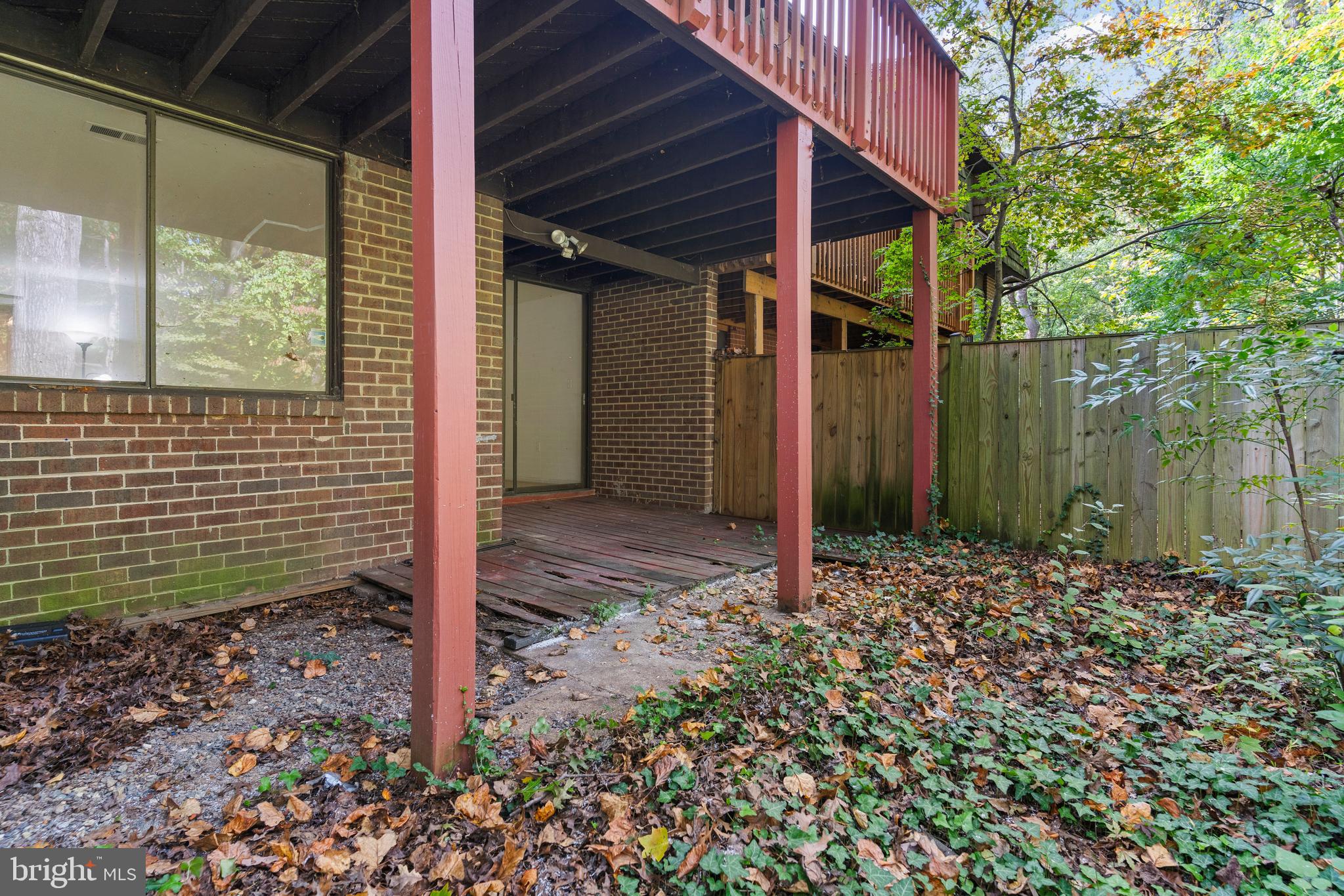 7911 Inverness Ridge Road Potomac, MD 20854 - Photo 39 of 45 a backyard of a house with lots of green space