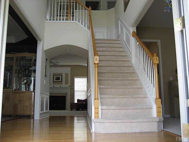 7552 Silver View Lane Raleigh, NC 27613 - Photo 5 of 10 a view of entryway and hall with wooden floor
