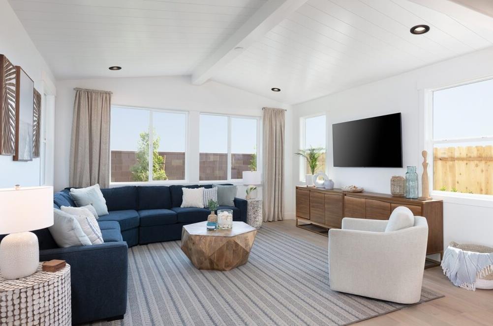 4424 Canyon Coral Way Rancho Cordova, CA 95742 - Photo 5 of 12 a living room with furniture and a flat screen tv