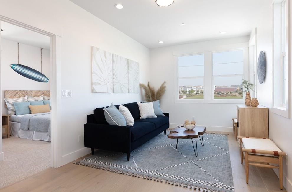 4424 Canyon Coral Way Rancho Cordova, CA 95742 - Photo 8 of 12 a living room with furniture and a large window