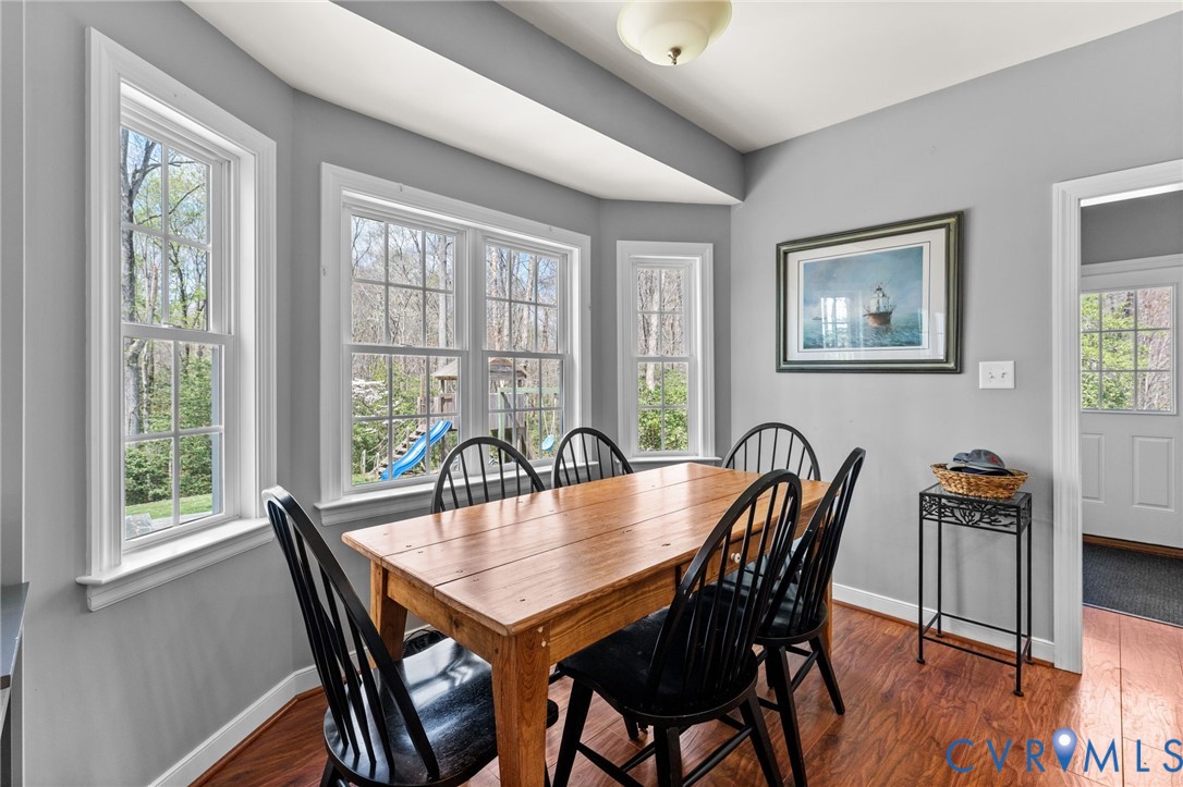 5610 Mt Landing Road Tappahannock, VA 22560 - Photo 13 of 36 Dining nook of Great Room with a rear yard view.
