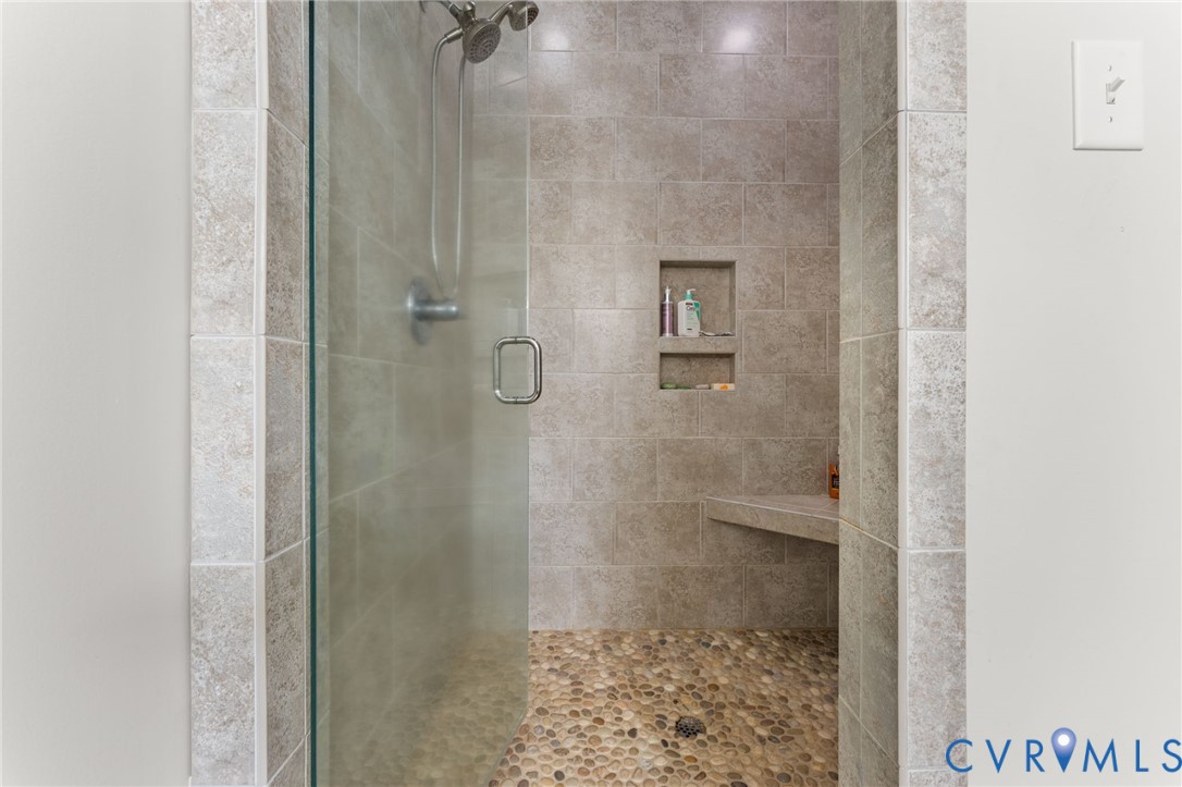 5610 Mt Landing Road Tappahannock, VA 22560 - Photo 20 of 36 Master walk-in shower with gorgeous River rock.