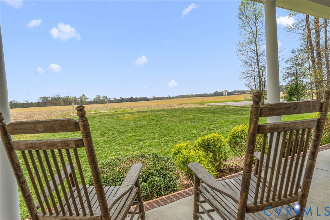 5610 Mt Landing Road Tappahannock, VA 22560 - Photo 34 of 36 Country front porch for your morning coffee in the