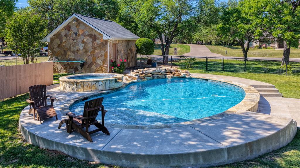 3707 DeCordova Ranch Road Granbury, TX 76049 - Photo 3 of 40 Gorgeous Pool and hot tub ready for summer!